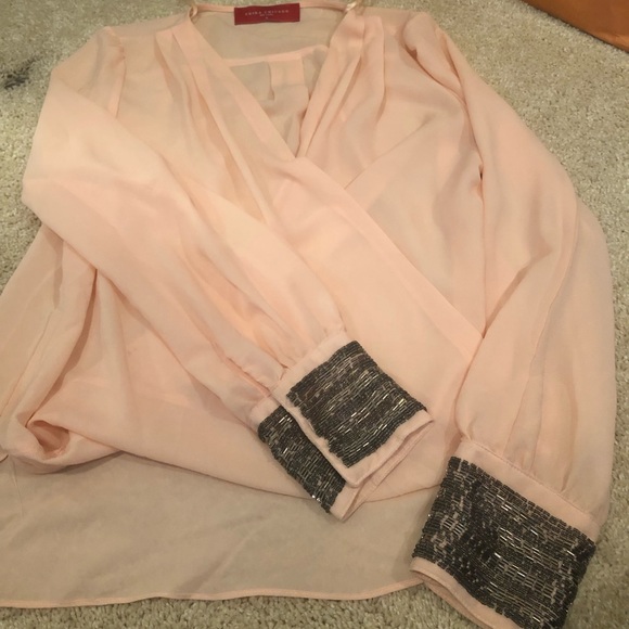 AKIRA Tops - Gorgeous faux wrap high low Akira embellished top!